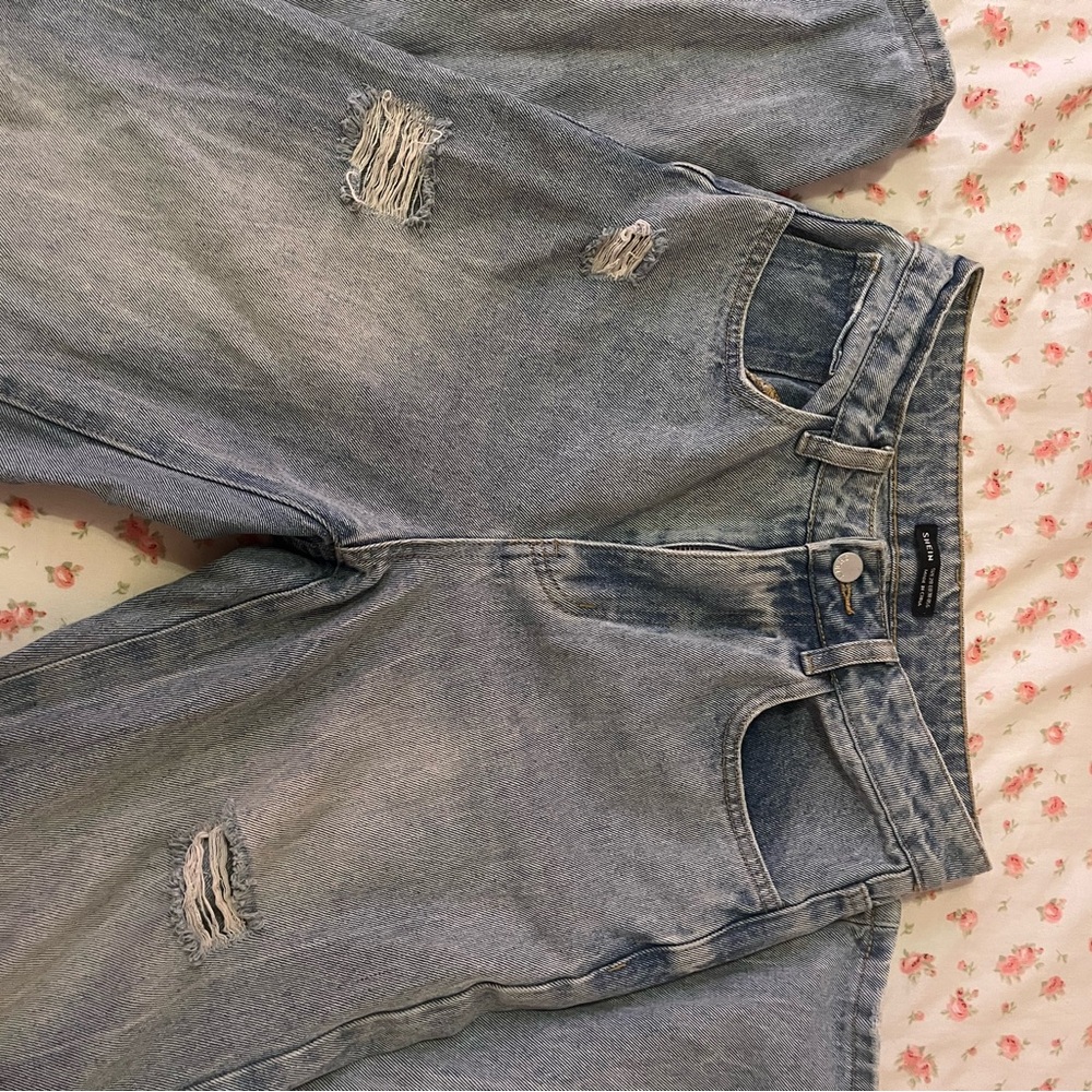 Distressed Light Blue Jeans